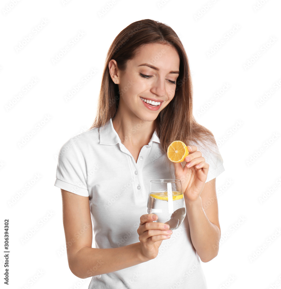 Young woman with glass of lemon water on white background Young woman with glass of lemon water on white background