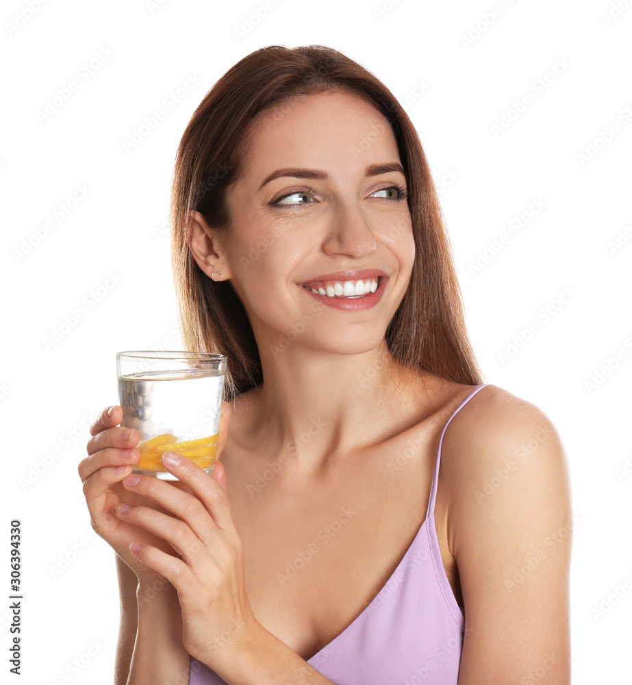 Young woman with glass of lemon water on white background Young woman with glass of lemon water on white background