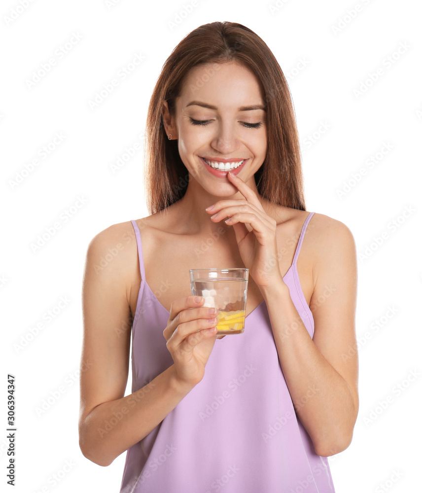 Young woman with glass of lemon water on white background Young woman with glass of lemon water on white background