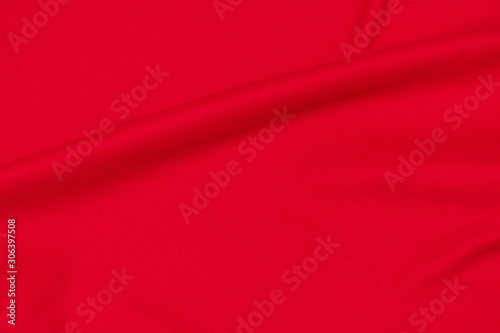 Red crumpled blanket, texture, top view, copy space