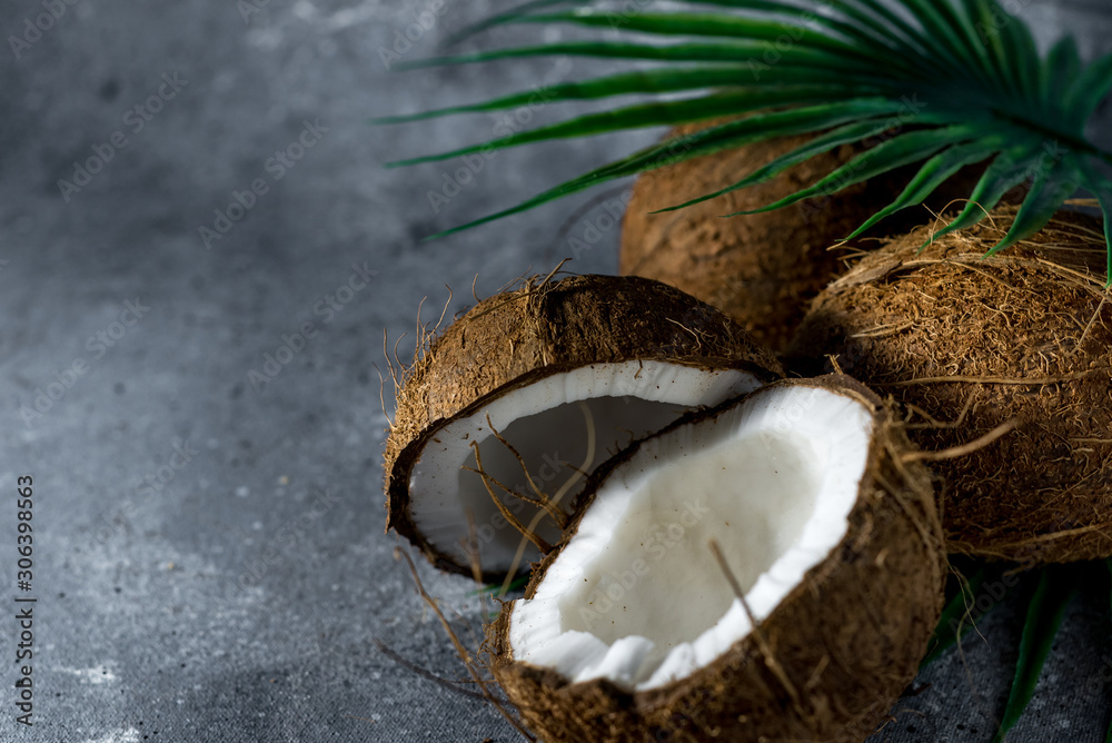 ripe chopped coconut on a gray stone background. place for your text ripe chopped coconut on a gray stone background. place for your text