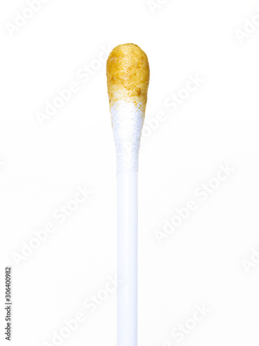 Cotton buds with Ear Wax isolated on white background.