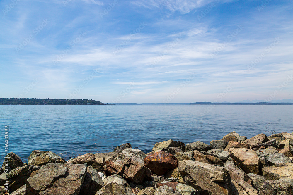 Looking out over the calm water of Elliott Bay, in the city of Seattle
