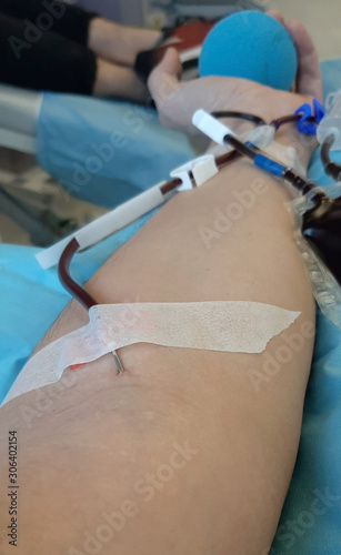 arm of donor during the blood donation