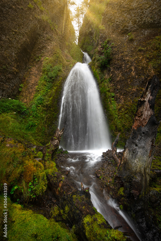 Fototapeta premium Sunshine over Wahkeena Falls at Columbia River Gorge, Oregon.