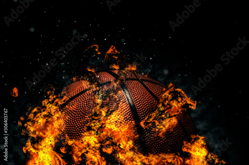 Basketball ball on black background with fire