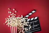 Movie clapper board and popcorn
