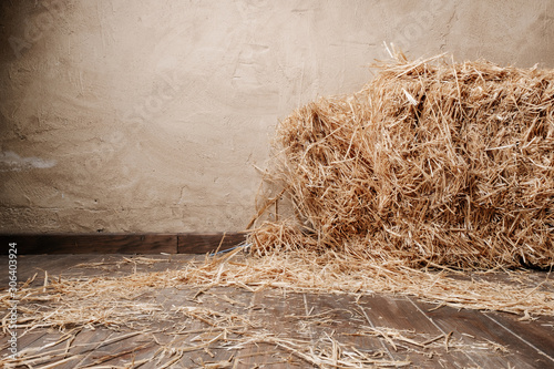 Wooden floor background and dry straw photo