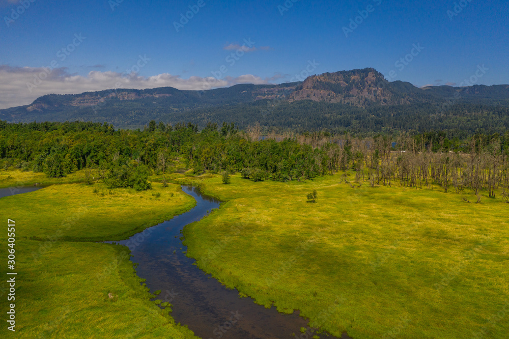 Aerial view of a stream leading toward the Columbia River Aerial view of a stream leading toward the Columbia River
