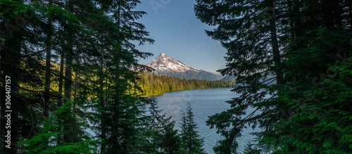 Panorama peering through trees to see Lost Lake and Mount Hood photo