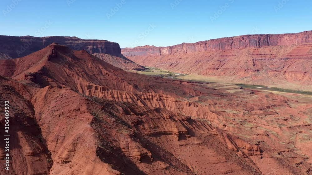 Aerial Over Sand Dunes And Red Sandstone Cliffs In The Gorge Of The Canyon Aerial Over Sand Dunes And Red Sandstone Cliffs In The Gorge Of The Canyon