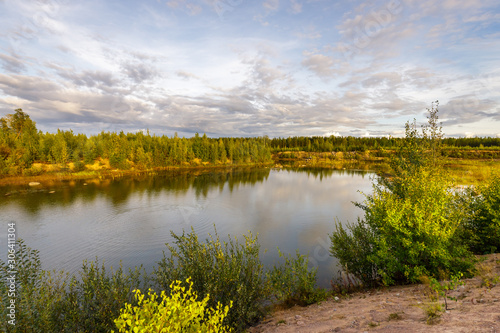 Forest lake and beautiful summer landscape. Vast territories of Karelia.