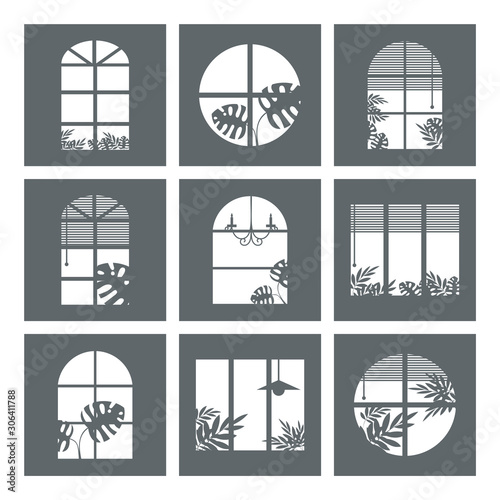 Collection of windows silhouette of various designs isolated. Window city at night. Vector illustration of apartment blocks with windows, in which silhouettes of tropical and home plants and curtains.
