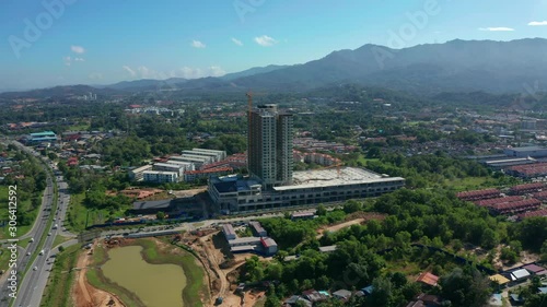 4K Aerial Drone Footage Of Beautiful Rural Town Of Menggatal Town, Sabah, Malaysia photo