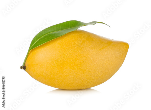 Yellow mango with leaves isolated on white background