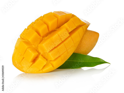 Mango fruit with leaves slices. Isolated on a white background.