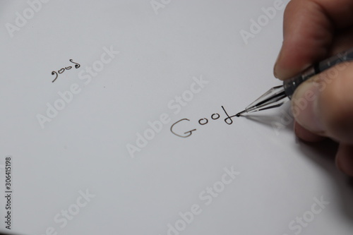 hand writing with pen on white paper  GOOD