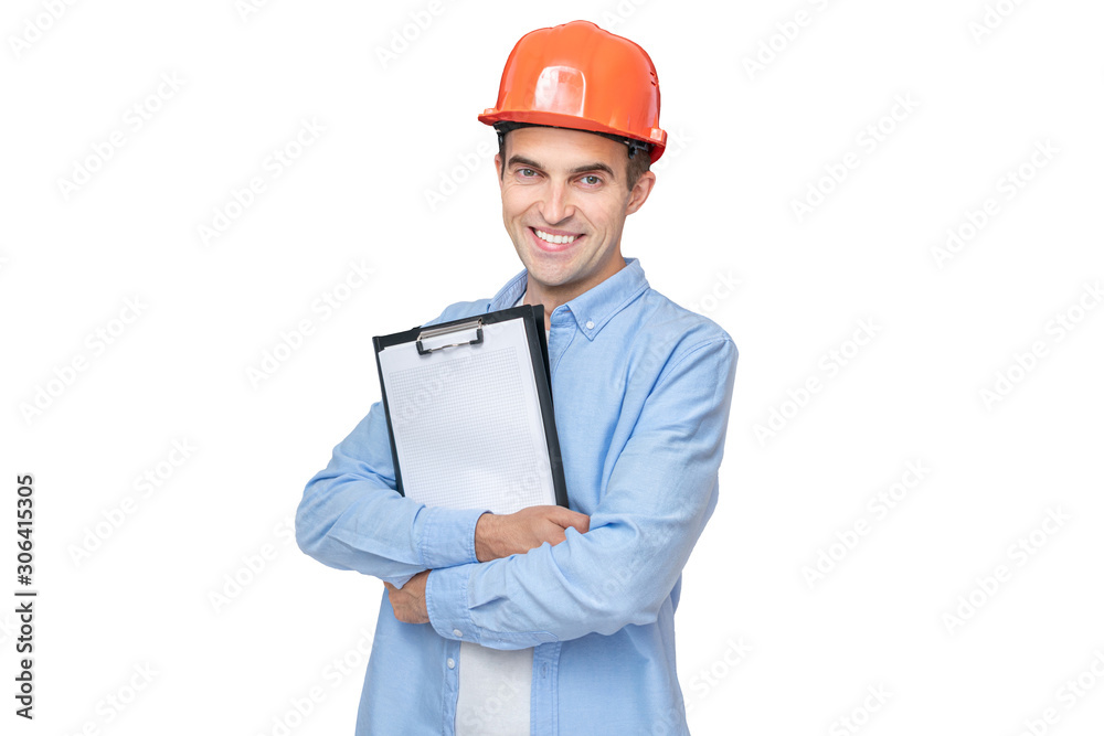 Builder in hardhat, man smiling and holding a notepad, isolated background, copy space Builder in hardhat, man smiling and holding a notepad, isolated background, copy space