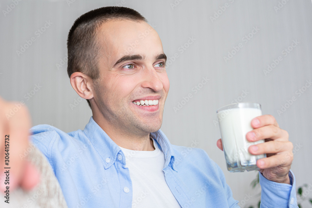 Happy man with a glass of milk, portrait, toned Happy man with a glass of milk, portrait, toned