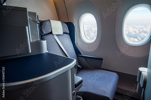 Airplane cabin business class interior © Anton Pedko