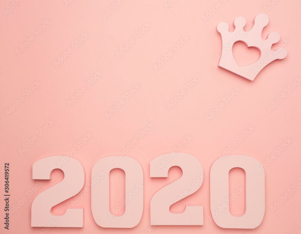Creative inspiration concepts 2020 with text number and crown on the color background.Business resolution, action plan ideas.Pink color pale shades. Creative inspiration concepts 2020 with text number and crown on the color background.Business resolution, action plan ideas.Pink color pale shades.