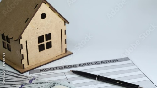 Temptaion of purchasing independent dwelling, completing mortgage application photo