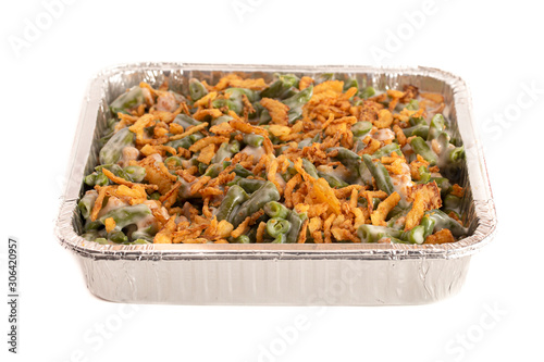 Pan of Traditional Green Bean Casserole with Fried Onions Isolated on a White Background