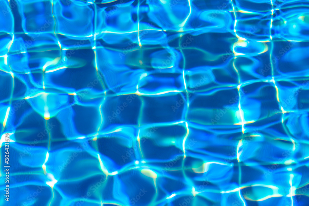 blue water in swimming pool beside the house. blue water in swimming pool beside the house.
