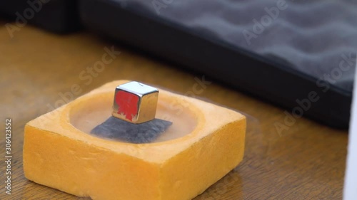 Superconductor and nitrogen - experience with liquid nitrogen cooling and magnet levitation. Quantum levitation. 4k footage.