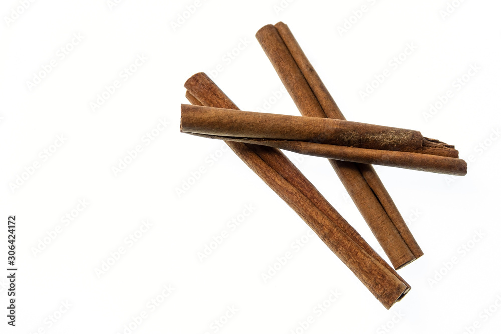 Cinnamon sticks on a white background Cinnamon sticks on a white background