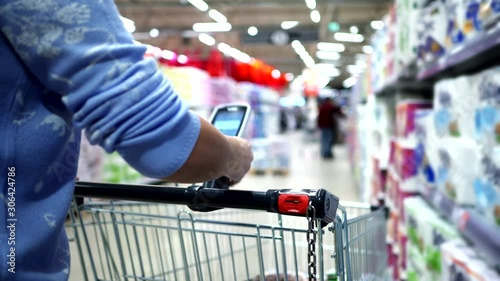 Modern shopping in the supermarket. Scanner cashier.