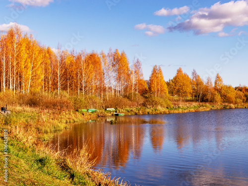 colorful autumn landscape by the lake, golden autumn, colorful trees and reflections