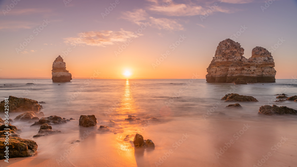 Coastal dreams. Travel concept. Algarve, Portugal. Sunset at dream beach.