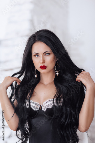 Portrait of beautiful brunette woman with makeup 