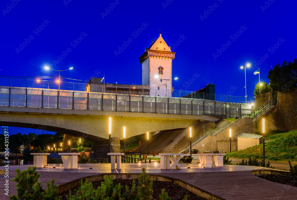 Sightseeing of Estonia. Beautiful night view of Narva Castle, the monument and popular tourist attraction