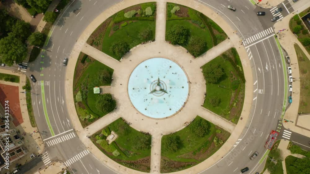 Aerial overhead view of Philadelphia Logan Square in the summer with traffic and cars driving around on the road Aerial overhead view of Philadelphia Logan Square in the summer with traffic and cars driving around on the road
