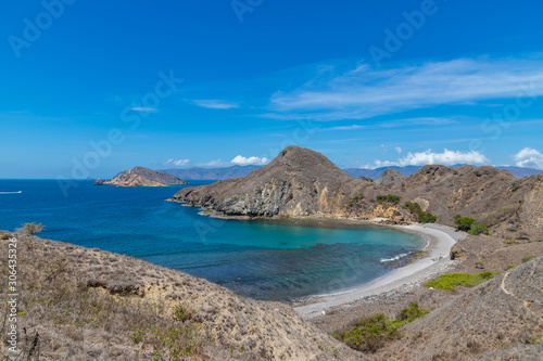 Landscape view at Padar island bay with crystal clear water in Komodo islands  Flores  Indonesia.