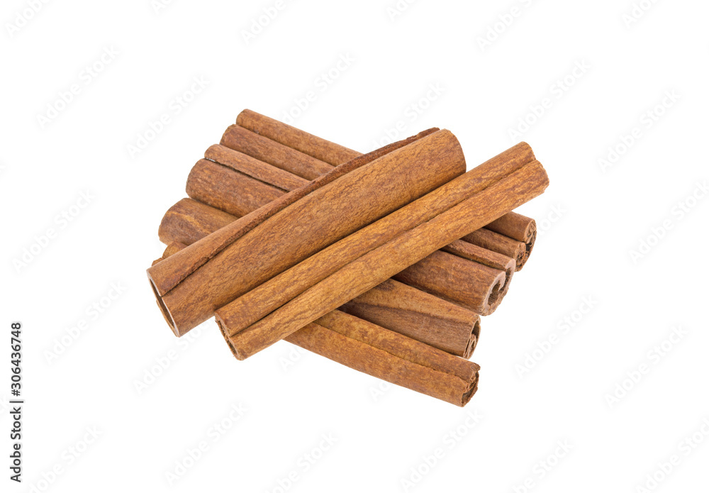 many cinnamon sticks on a white background isolated many cinnamon sticks on a white background isolated