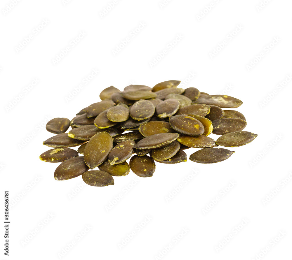 Pumpkin dried seeds isolated on white Pumpkin dried seeds isolated on white
