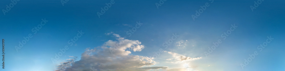 beautiful clouds in blue sky with evening sun. Seamless hdri panorama 360 degrees angle view  with zenith for use in 3d graphics or game development as sky dome or edit drone shot