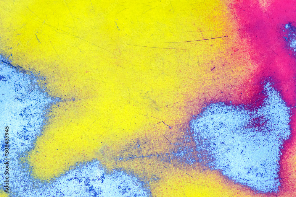 abstract background. yellow-red paint polished to a metal base