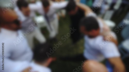 Blurred persons dance in a circle, Jewish tradition
