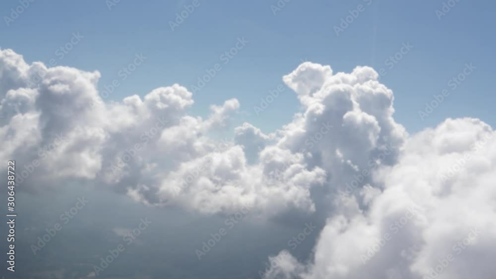 Flying inside the fluffy clouds. Overlooking the blue sky. Flying inside the fluffy clouds. Overlooking the blue sky.