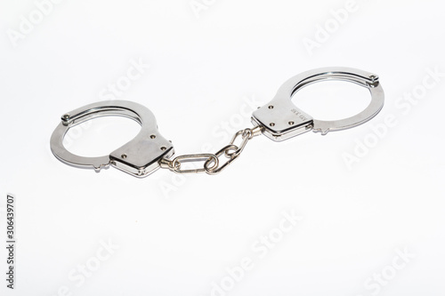 steel handcuffs on a white background