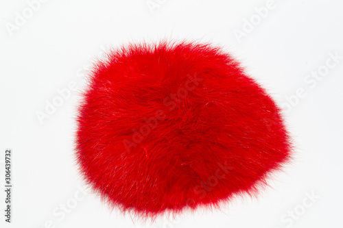 Red fluff on a white background