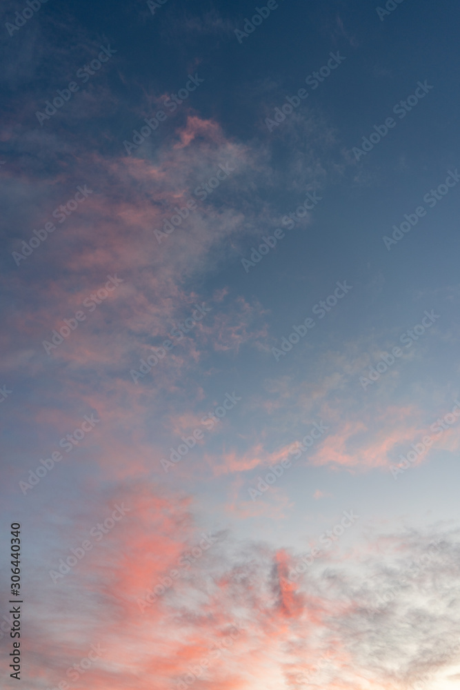 Blue Sky at Dawn with Pink Clouds