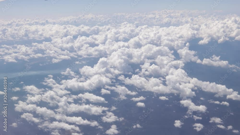 Flying inside the fluffy clouds. Overlooking the blue sky. Flying inside the fluffy clouds. Overlooking the blue sky.