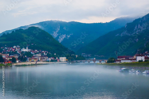 The Mehmed Pasa Sokolovic Bridge and Drina river in the evening fog. Visegrad. Bosnia and Herzegovina.