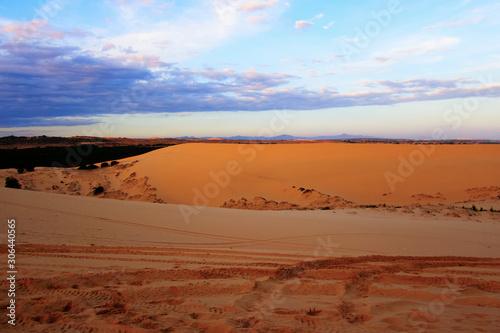 Sand dune with blue sky background at Mui ne , Vietnam