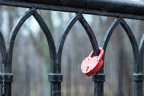  a solitary red castle on the bridge, in the form of hearts.